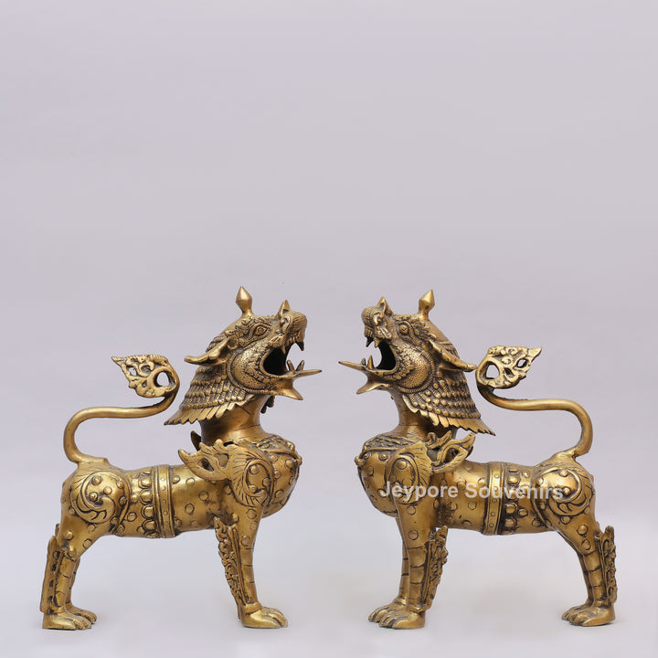 Handcrafted Solid Brass Tibetan Snow Standing Lion Statue with Ornate Scrollwork