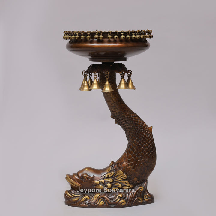 Brass Urli Bowl on Ornate Fish Stand with Hanging Bells