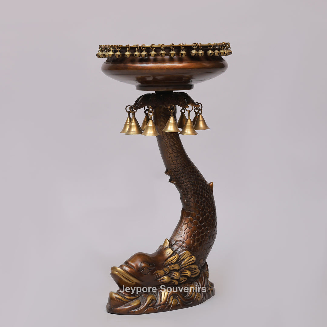 Brass Urli Bowl on Ornate Fish Stand with Hanging Bells