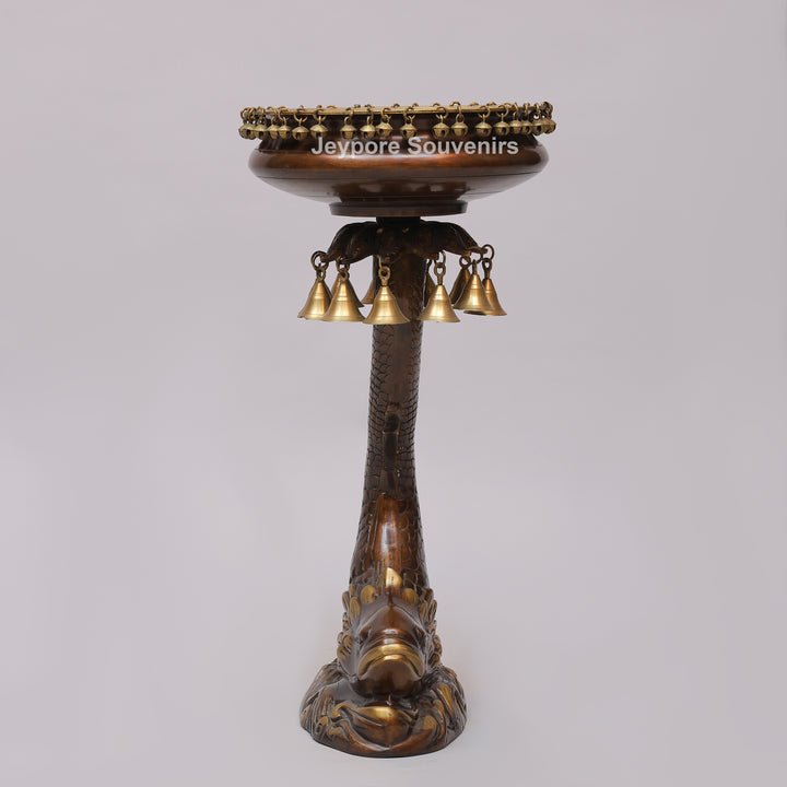 Brass Urli Bowl on Ornate Fish Stand with Hanging Bells