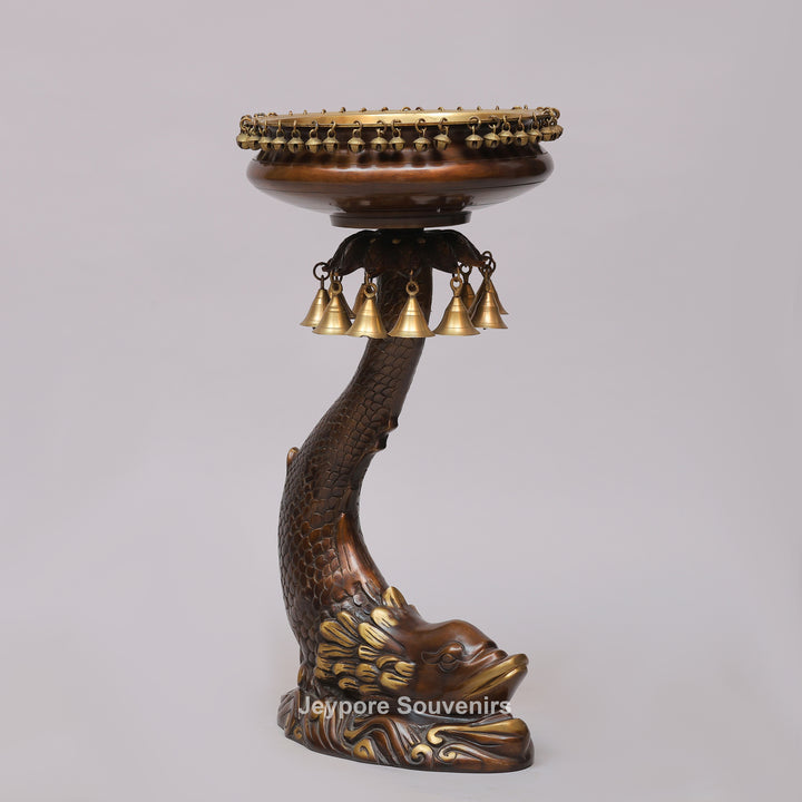 Brass Urli Bowl on Ornate Fish Stand with Hanging Bells