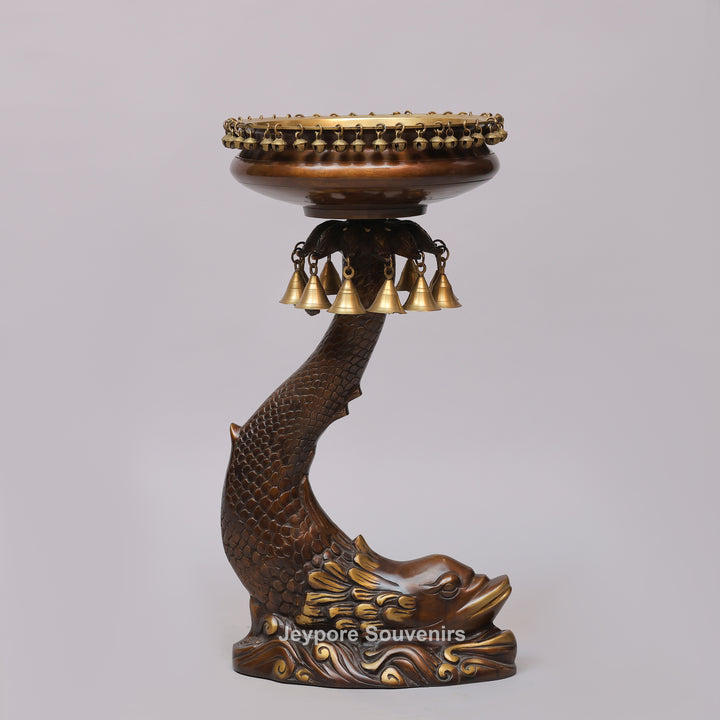 Brass Urli Bowl on Ornate Fish Stand with Hanging Bells