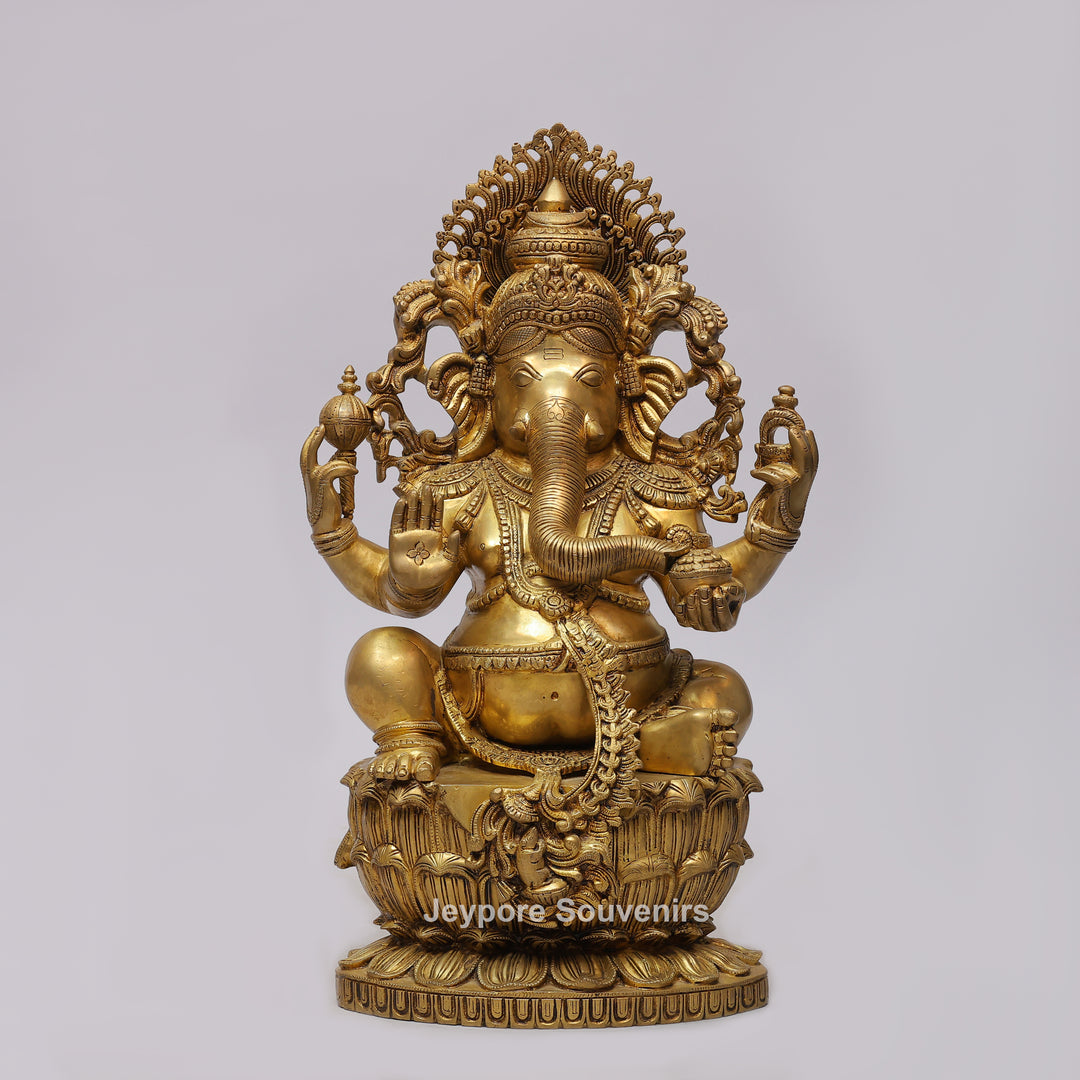 Handcrafted Brass Four-Armed Lord Ganesha Statue on Lotus Pedestal