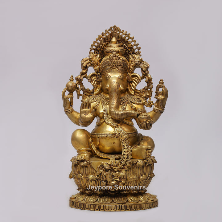 Handcrafted Brass Four-Armed Lord Ganesha Statue on Lotus Pedestal