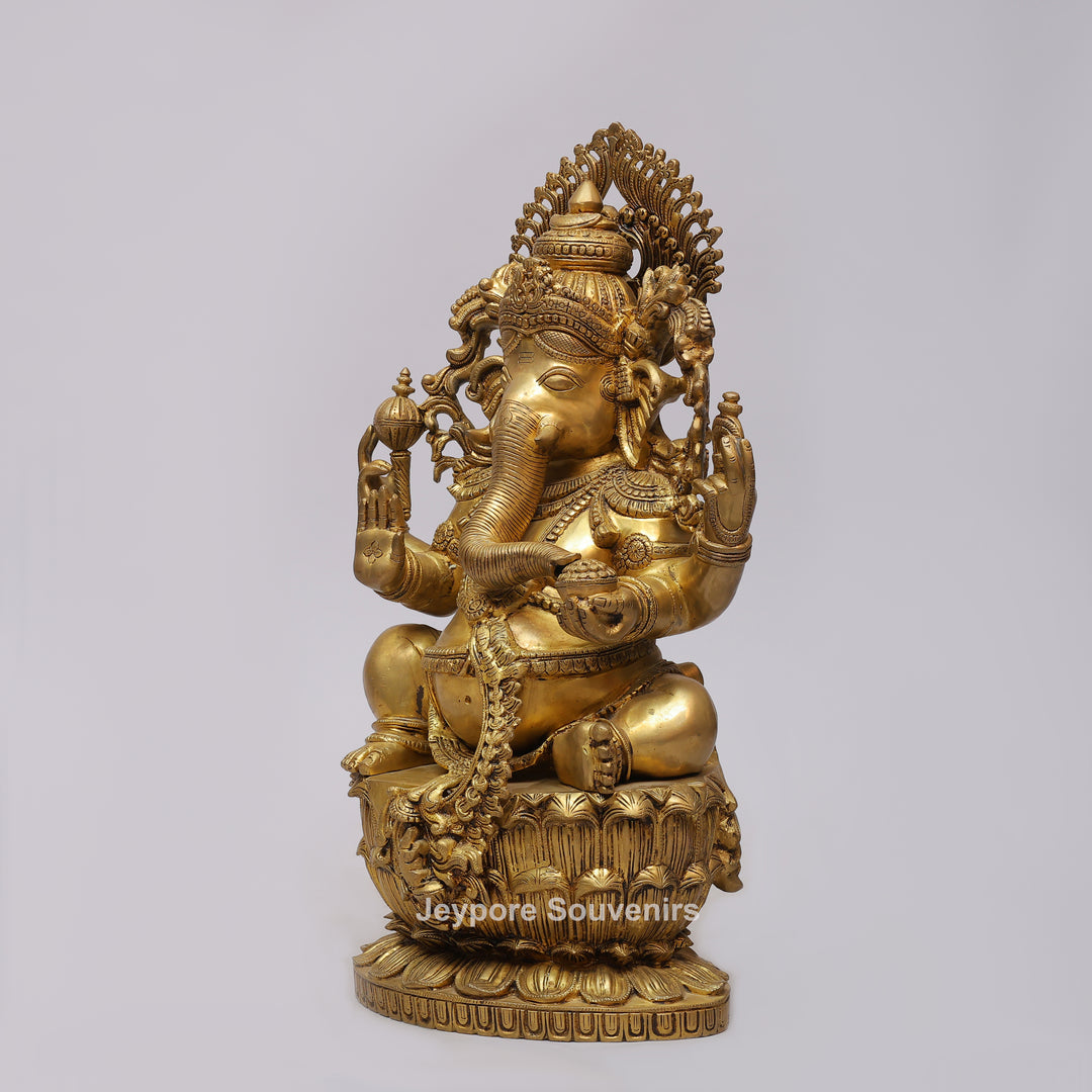 Handcrafted Brass Four-Armed Lord Ganesha Statue on Lotus Pedestal
