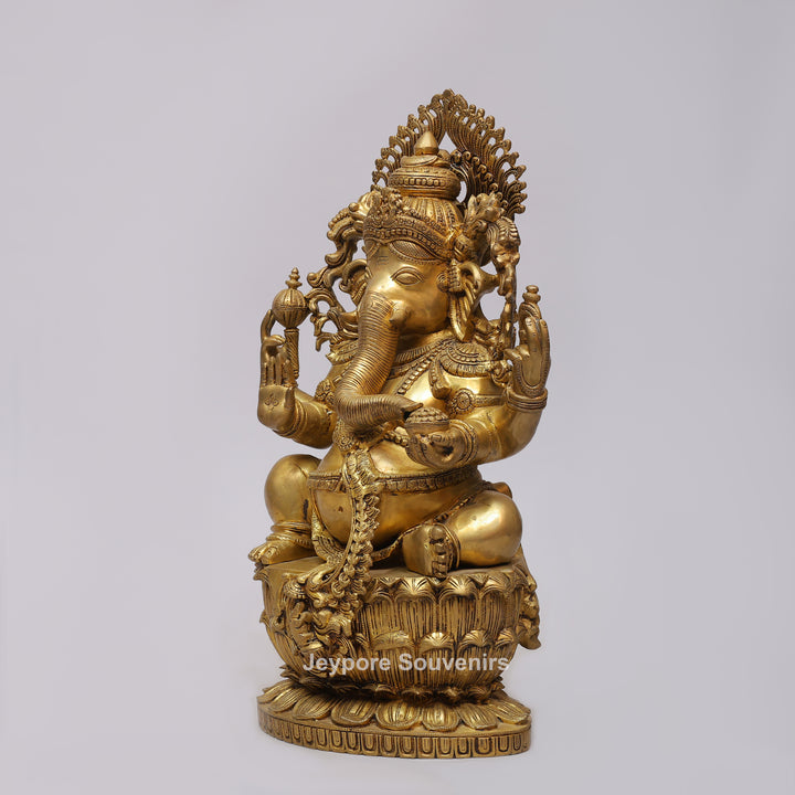 Handcrafted Brass Four-Armed Lord Ganesha Statue on Lotus Pedestal