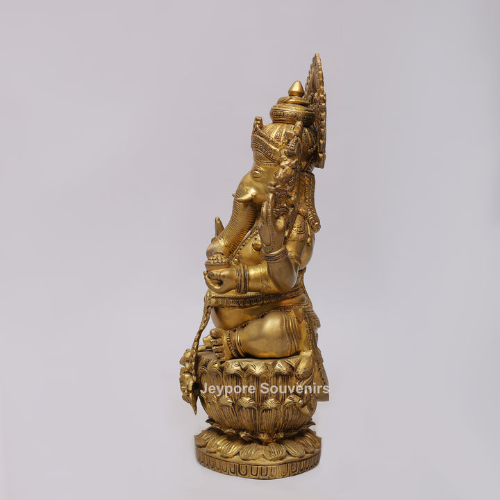 Handcrafted Brass Four-Armed Lord Ganesha Statue on Lotus Pedestal