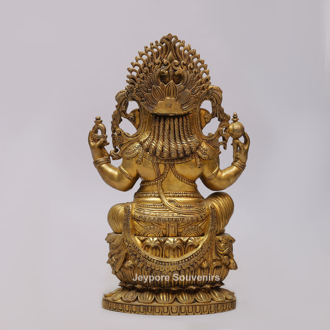 Handcrafted Brass Four-Armed Lord Ganesha Statue on Lotus Pedestal