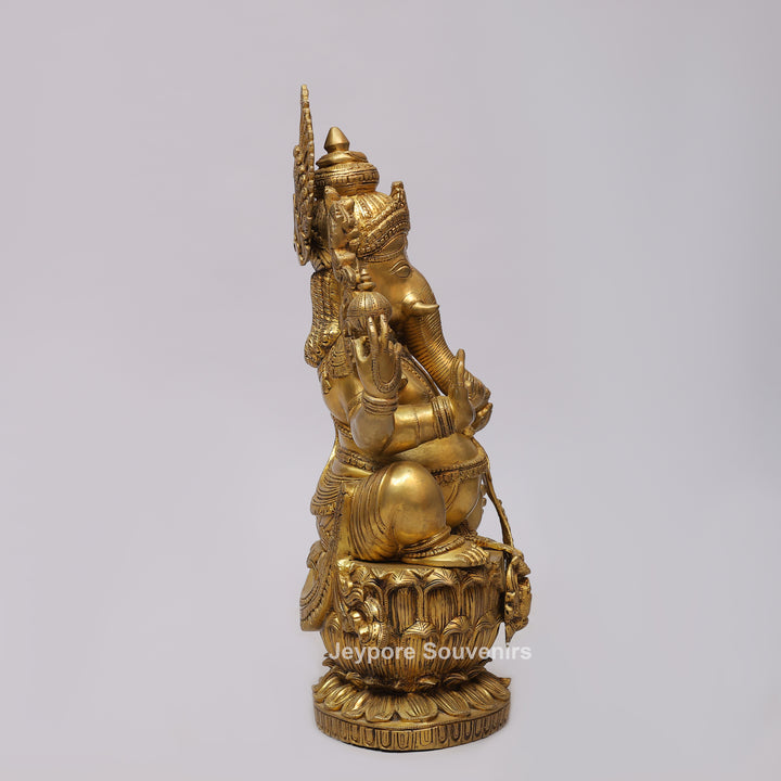 Handcrafted Brass Four-Armed Lord Ganesha Statue on Lotus Pedestal