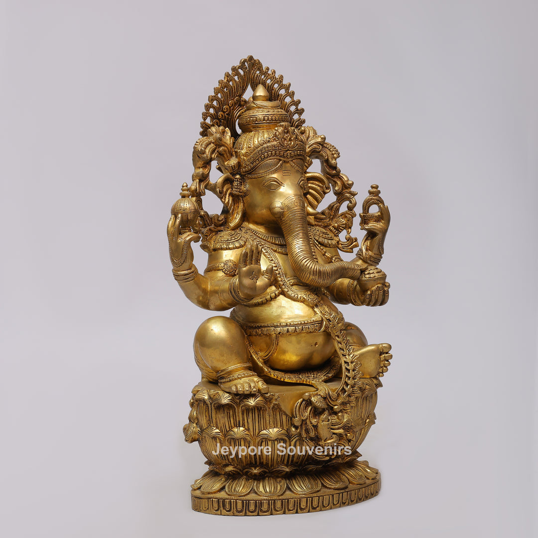 Handcrafted Brass Four-Armed Lord Ganesha Statue on Lotus Pedestal