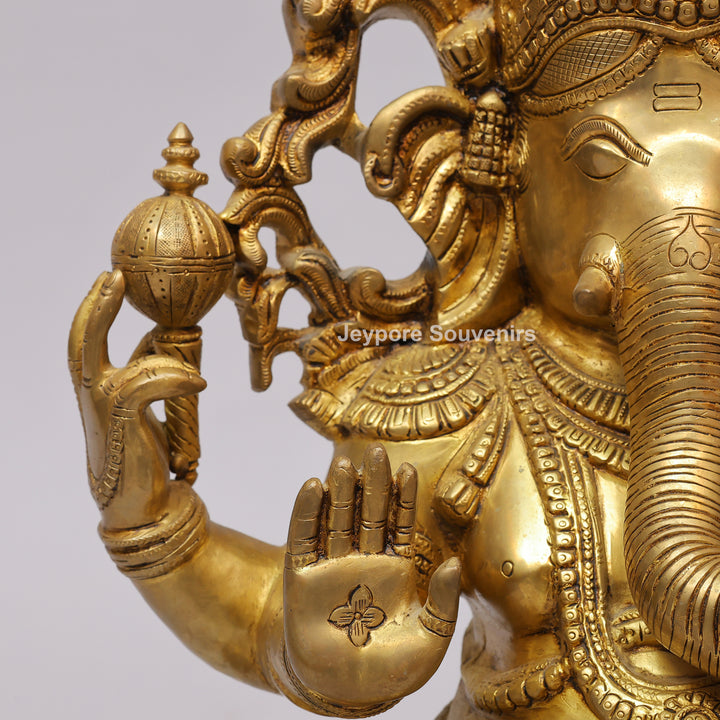 Handcrafted Brass Four-Armed Lord Ganesha Statue on Lotus Pedestal