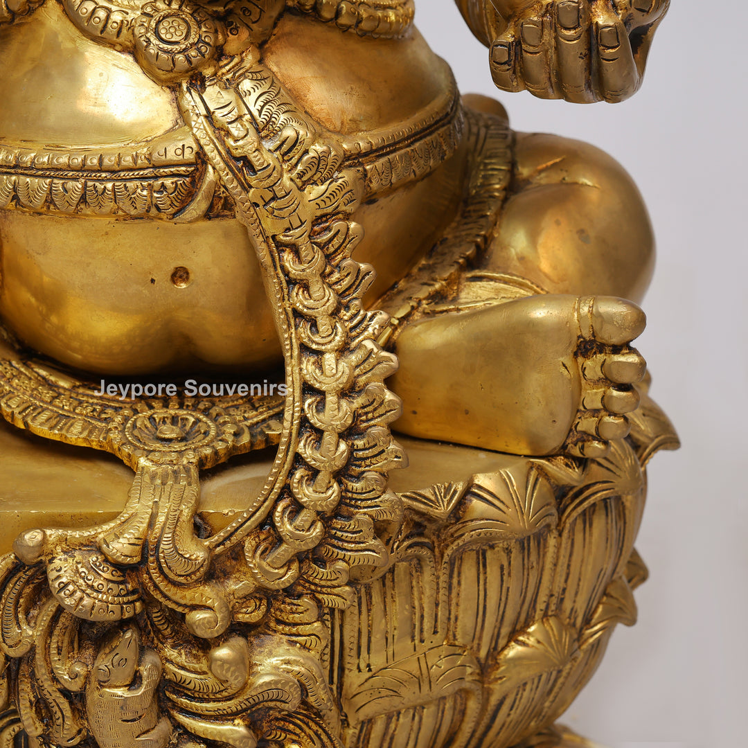 Handcrafted Brass Four-Armed Lord Ganesha Statue on Lotus Pedestal