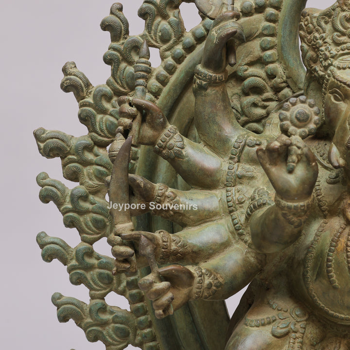 Handcrafted 12-Armed Dancing Lord Ganesha Brass Statue