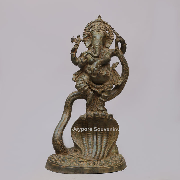 Antique Brass Dancing Lord Ganesha on Multi-Headed Serpent