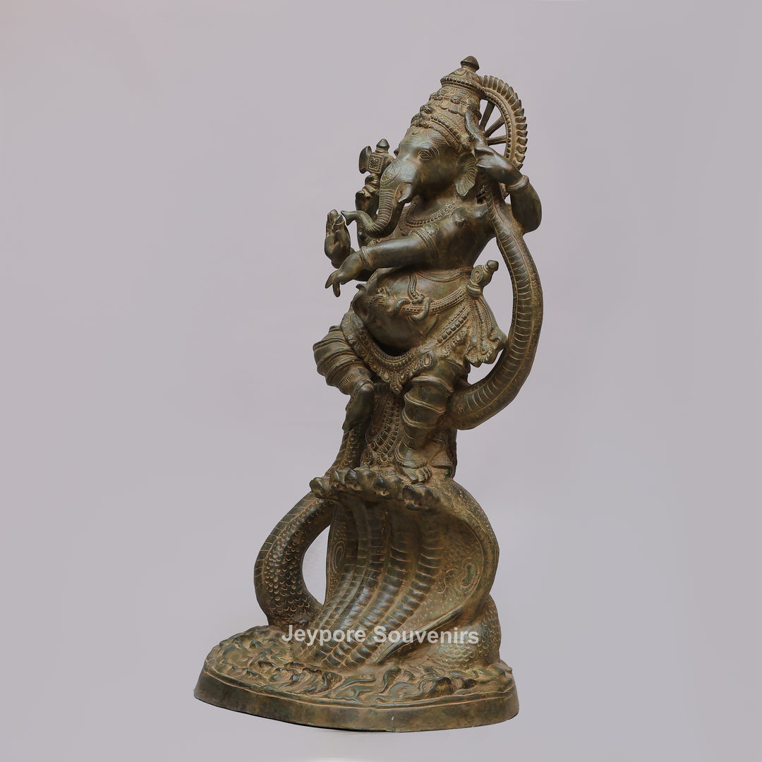 Antique Brass Dancing Lord Ganesha on Multi-Headed Serpent