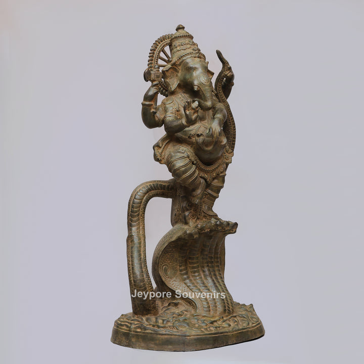 Antique Brass Dancing Lord Ganesha on Multi-Headed Serpent
