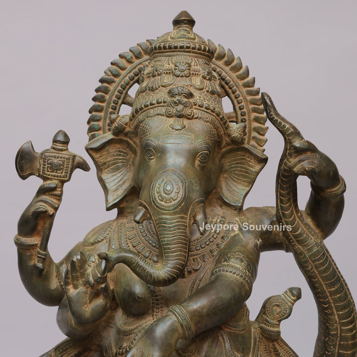 Antique Brass Dancing Lord Ganesha on Multi-Headed Serpent