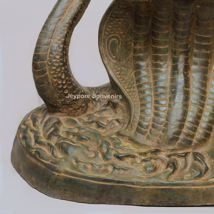 Antique Brass Dancing Lord Ganesha on Multi-Headed Serpent