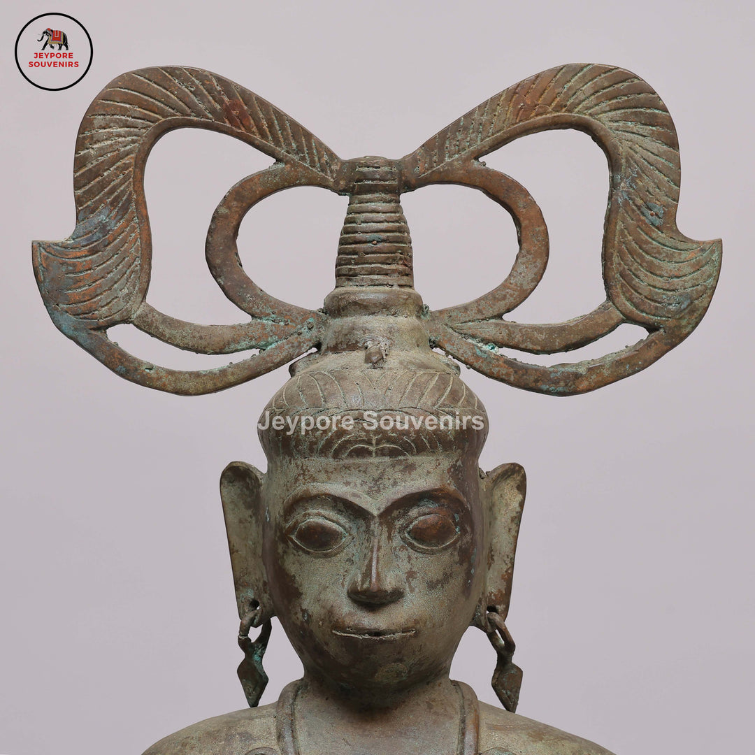 Handcrafted Brass Tribal Figurine with Winged Crown &amp; Crescent-Horn Attributes