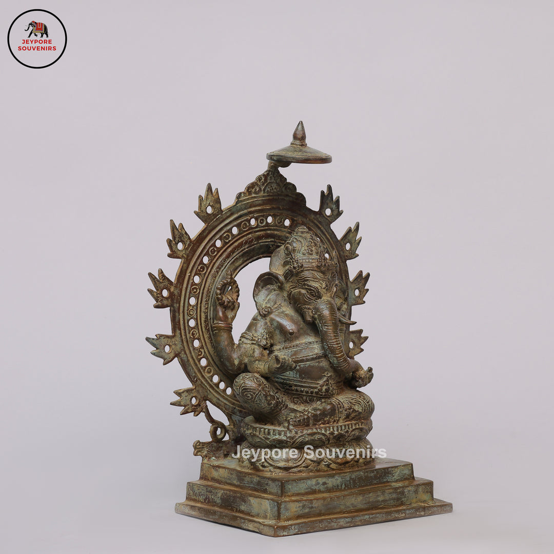 Handcrafted Bronze Ganesha Statue with Ornate Prabhavali