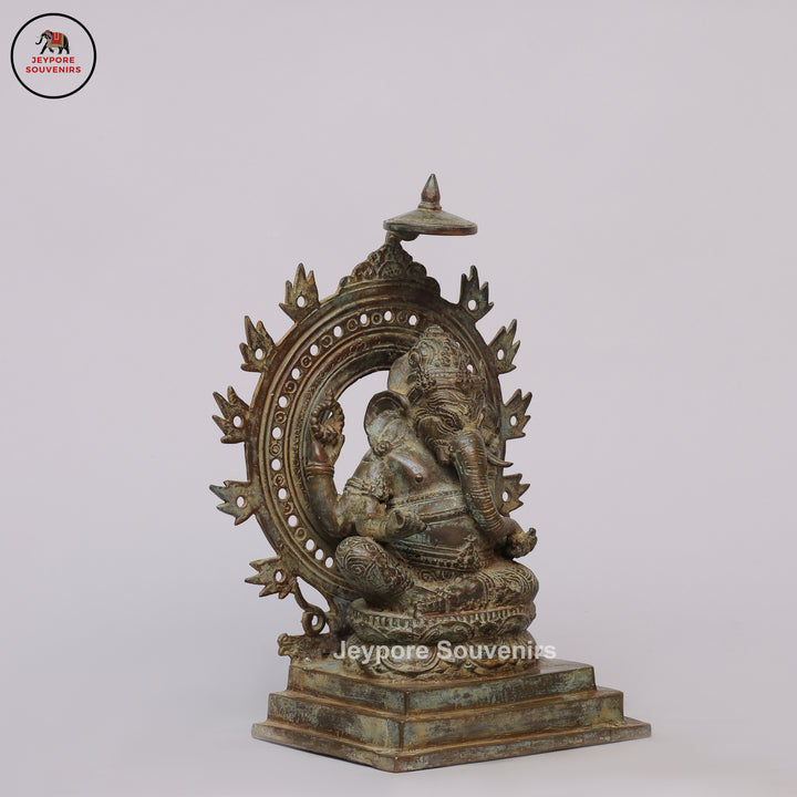 Handcrafted Bronze Ganesha Statue with Ornate Prabhavali
