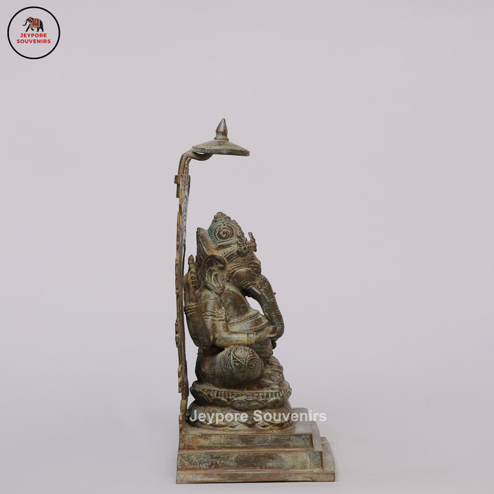 Handcrafted Bronze Ganesha Statue with Ornate Prabhavali