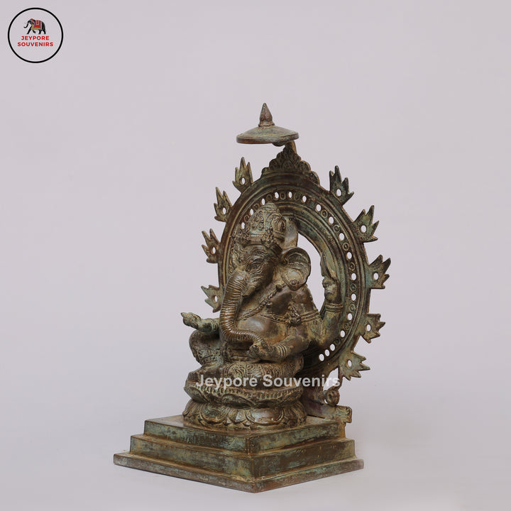 Handcrafted Bronze Ganesha Statue with Ornate Prabhavali