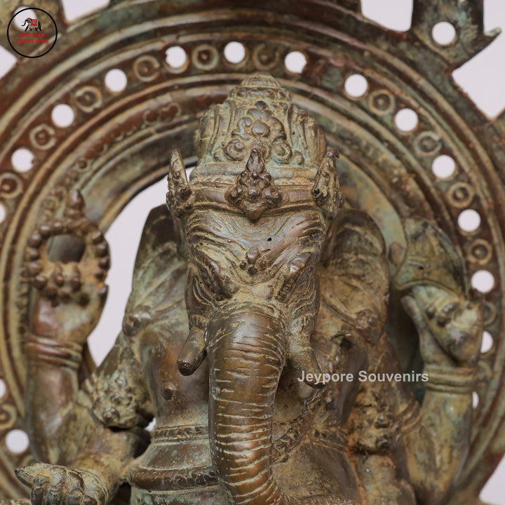 Handcrafted Bronze Ganesha Statue with Ornate Prabhavali