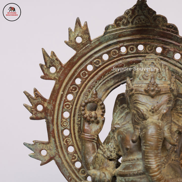 Handcrafted Bronze Ganesha Statue with Ornate Prabhavali