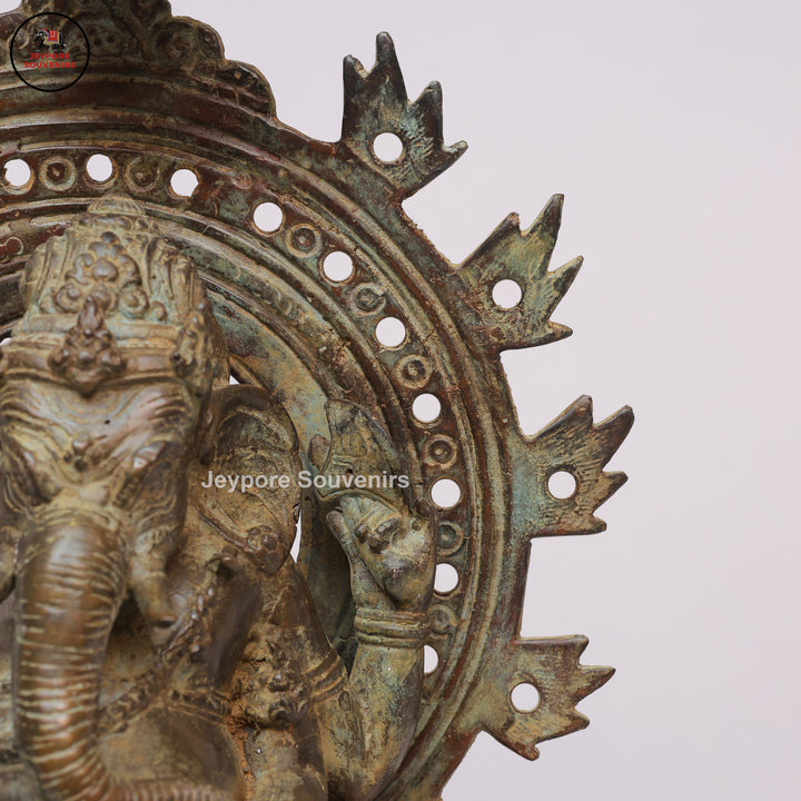 Handcrafted Bronze Ganesha Statue with Ornate Prabhavali