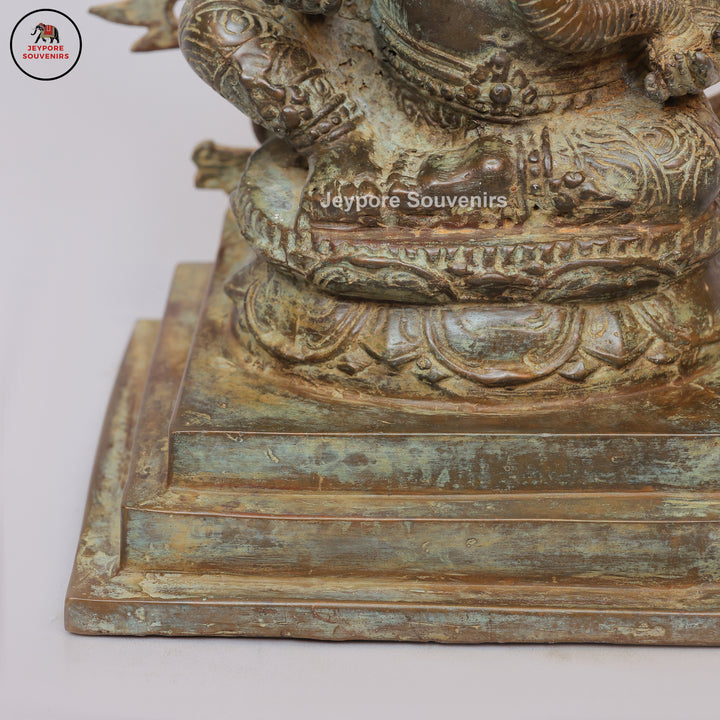 Handcrafted Bronze Ganesha Statue with Ornate Prabhavali