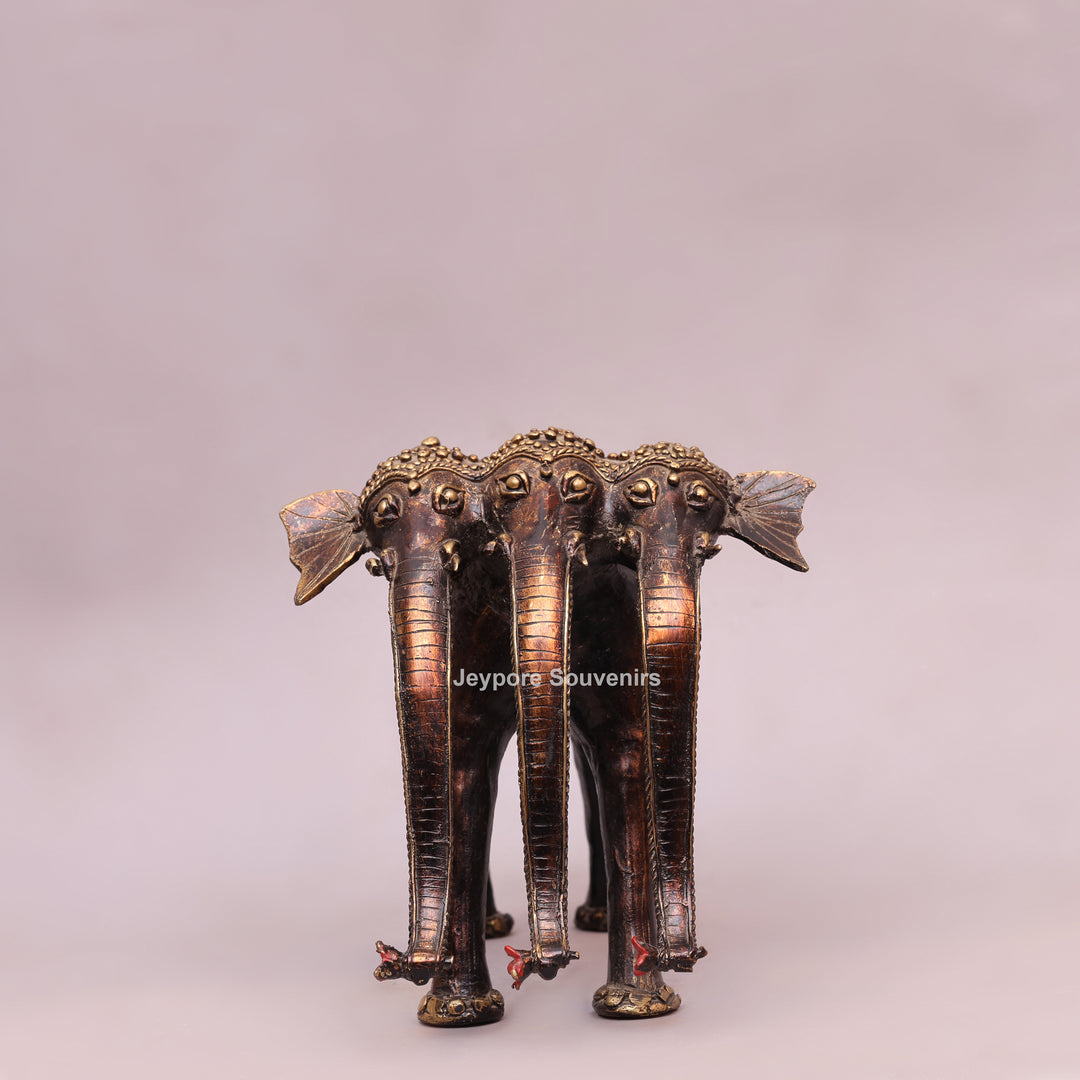 Handcrafted Dhokra Brass Triple-Trunk Elephant Statue with Red Saddle