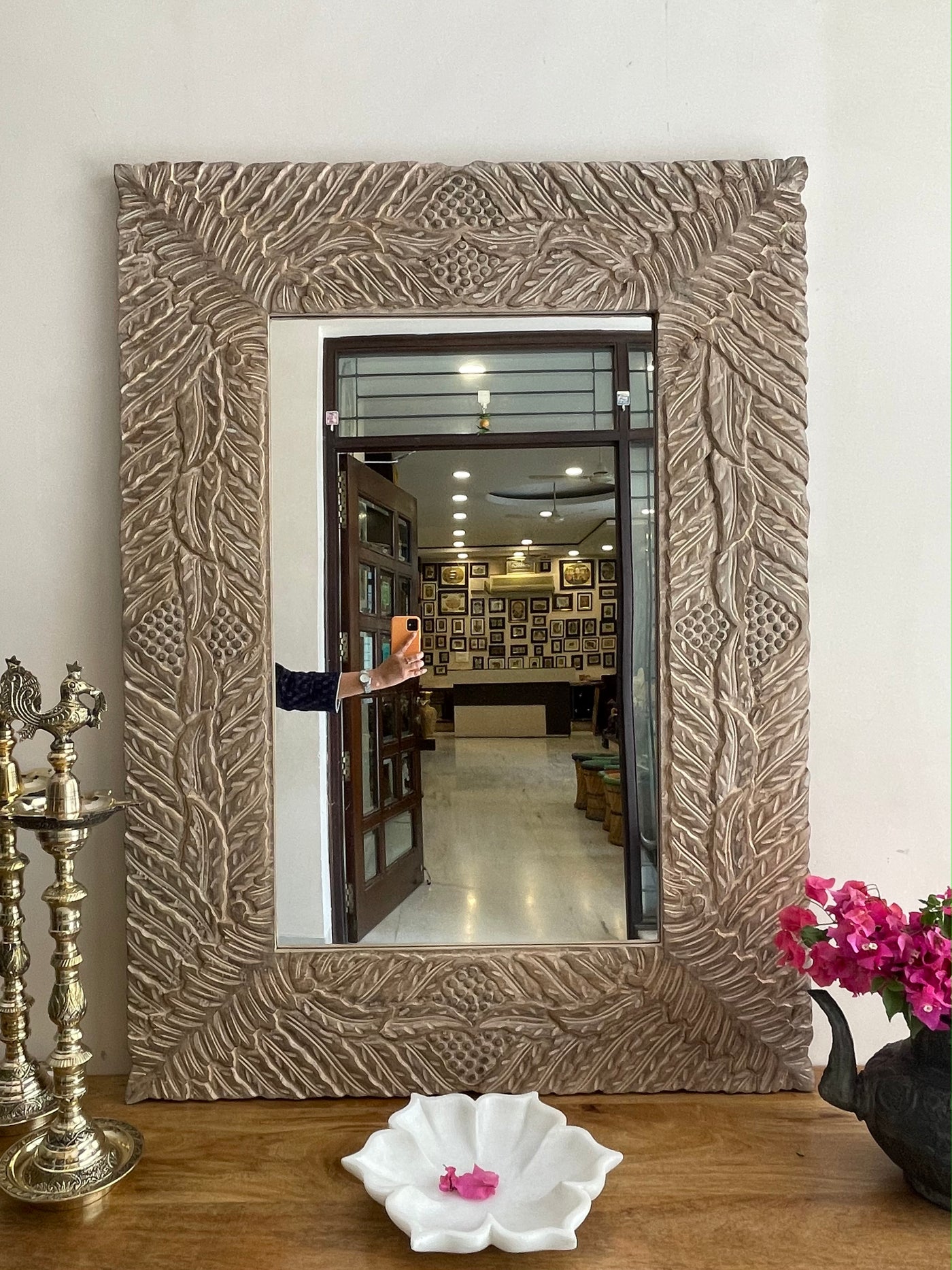 Hand carved mirror frame in distressed finish