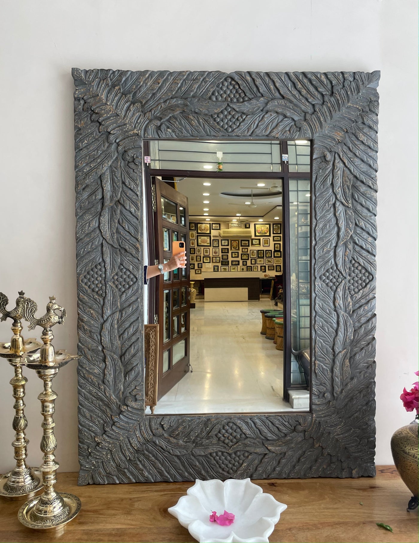 Hand carved mirror frame in distressed finish