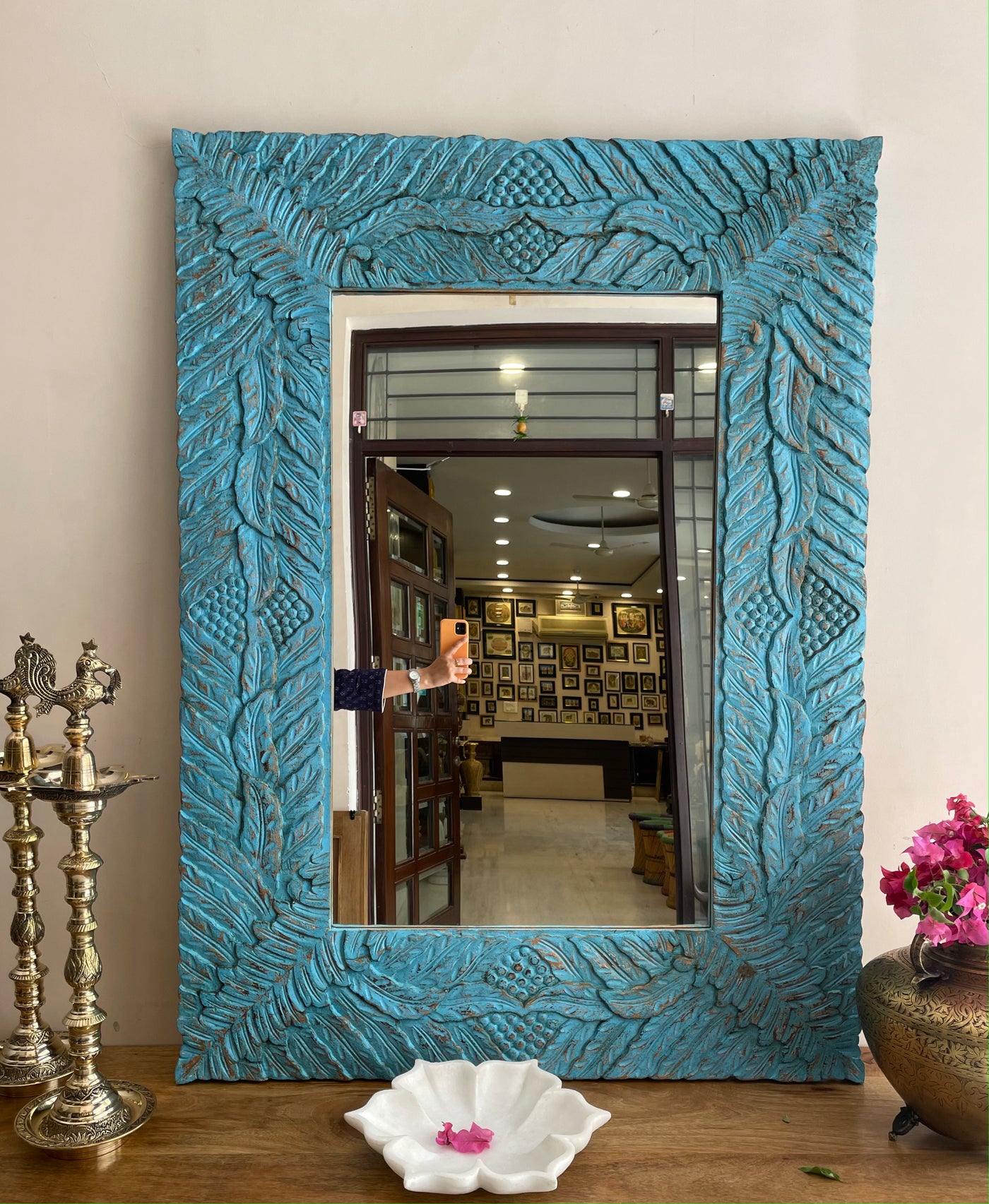 Hand carved mirror frame in distressed finish