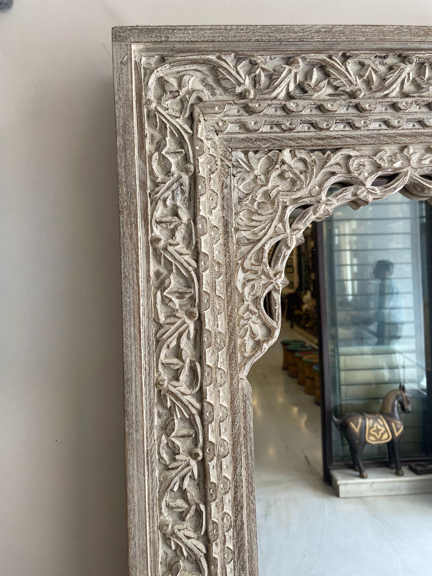 Hand carved jharokha mirror frame in distressed finish