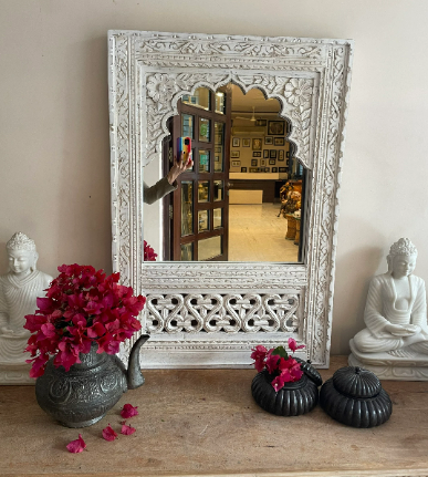 Hand carved mirror in distressed finish