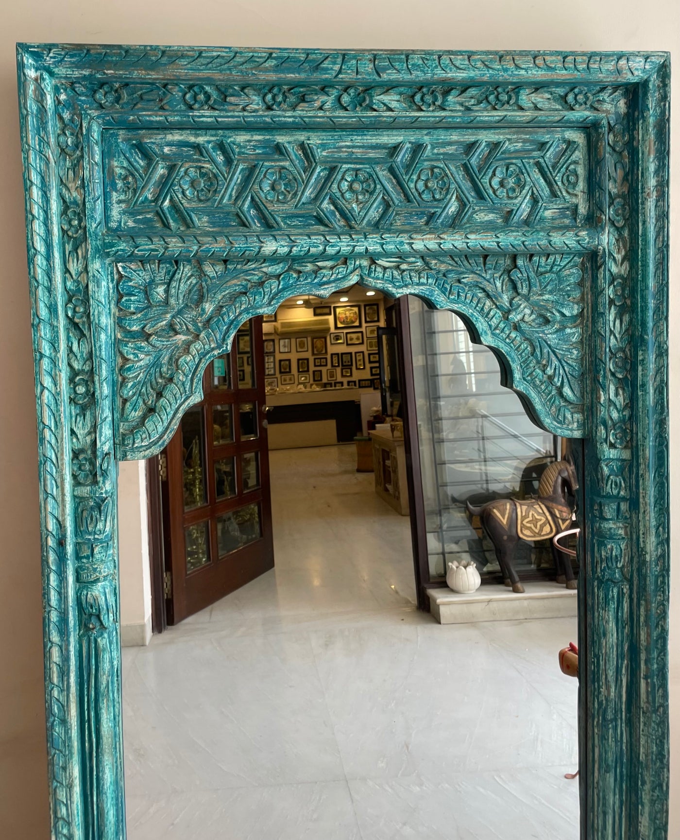 Hand carved mirror in distressed finish