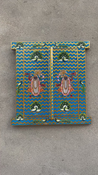 Window with Handpainted Shrinathji surrounded by peacock motifs