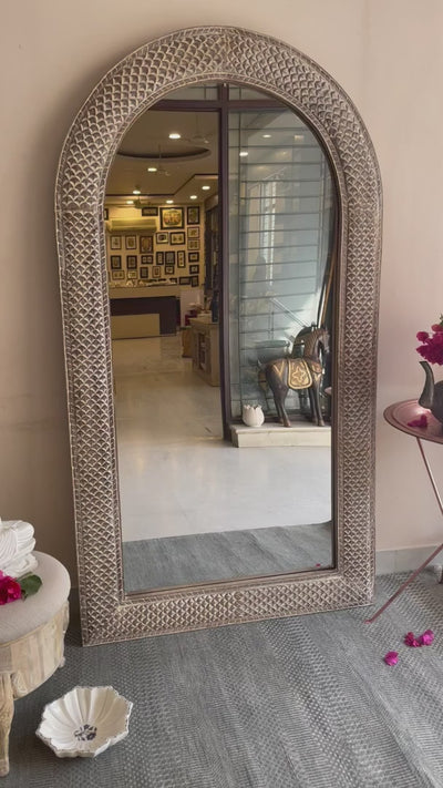 Hand carved mirror in distressed finish