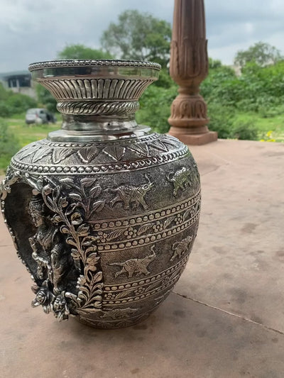 Silver Hand Carved Vase depicting Lord Ganesha and Goddess Laxmi