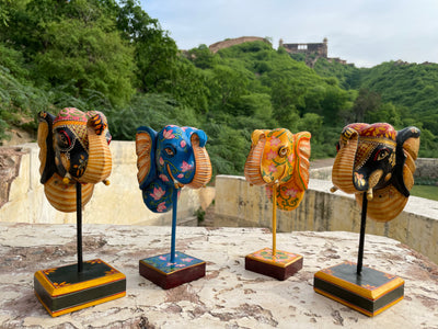 Hand Painted Wooden Elephant face on a stand