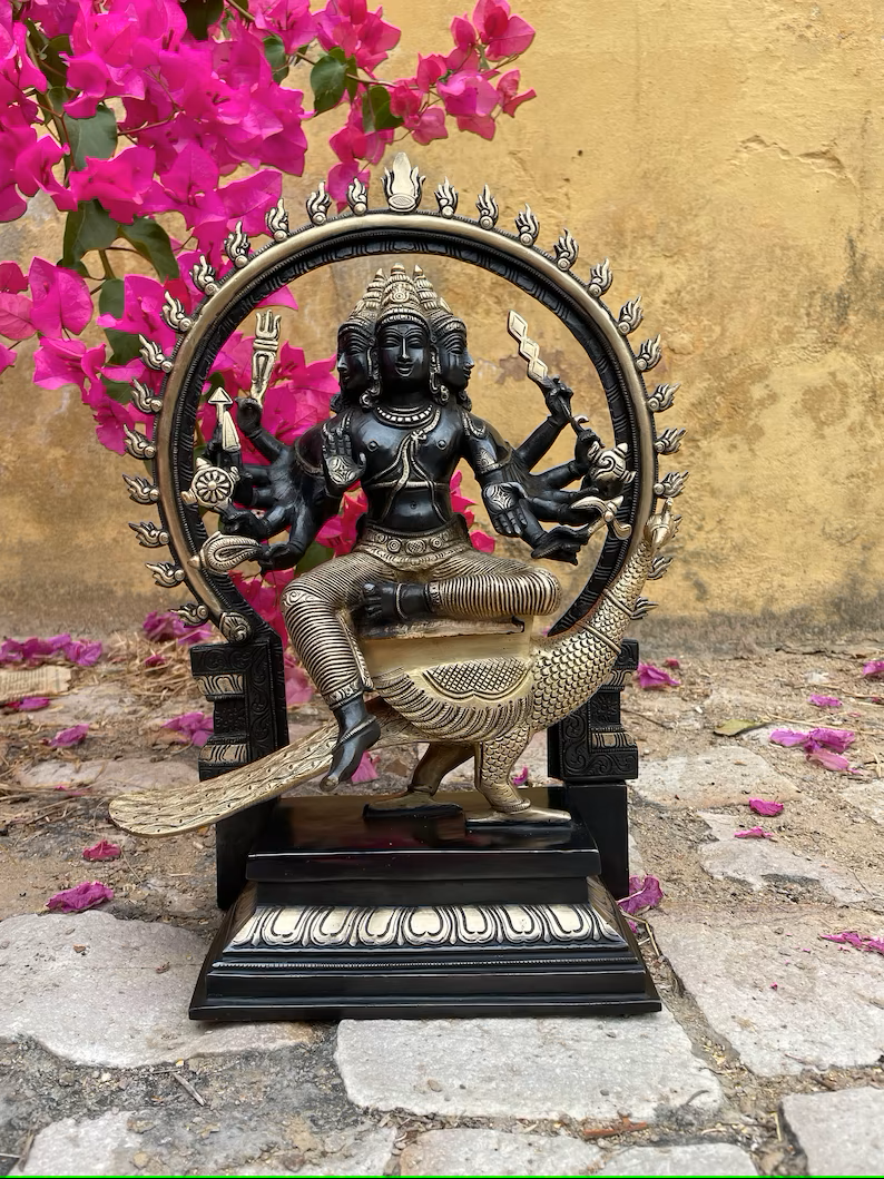 Handcrafted brass statue of Lord Murugan/Kartikeya on peacock